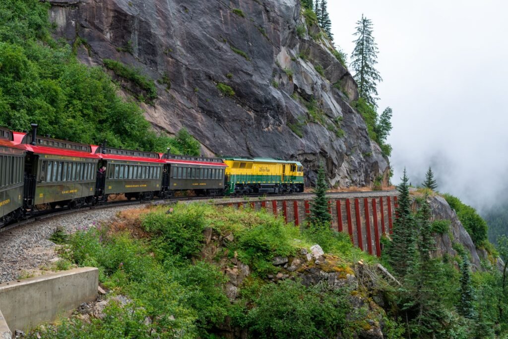 White Pass & Yukon Route train on a cliffside curve above Skagway, Alaska